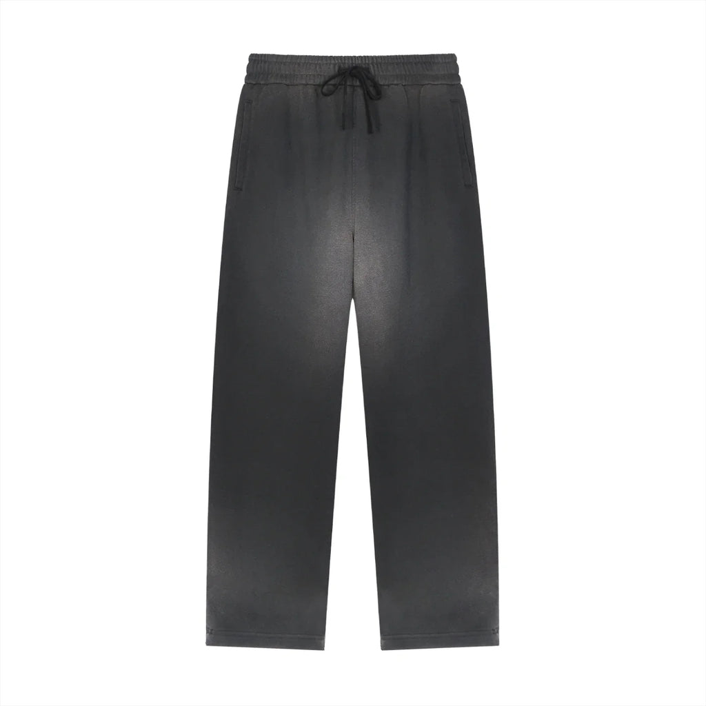 black streetwear sweatpants with elastic waistband and drawstring, front view, on white background