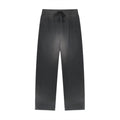 black streetwear sweatpants with elastic waistband and drawstring, front view, on white background