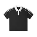 Black short sleeve polo shirt with white collar and white stripes on shoulders, streetwear style