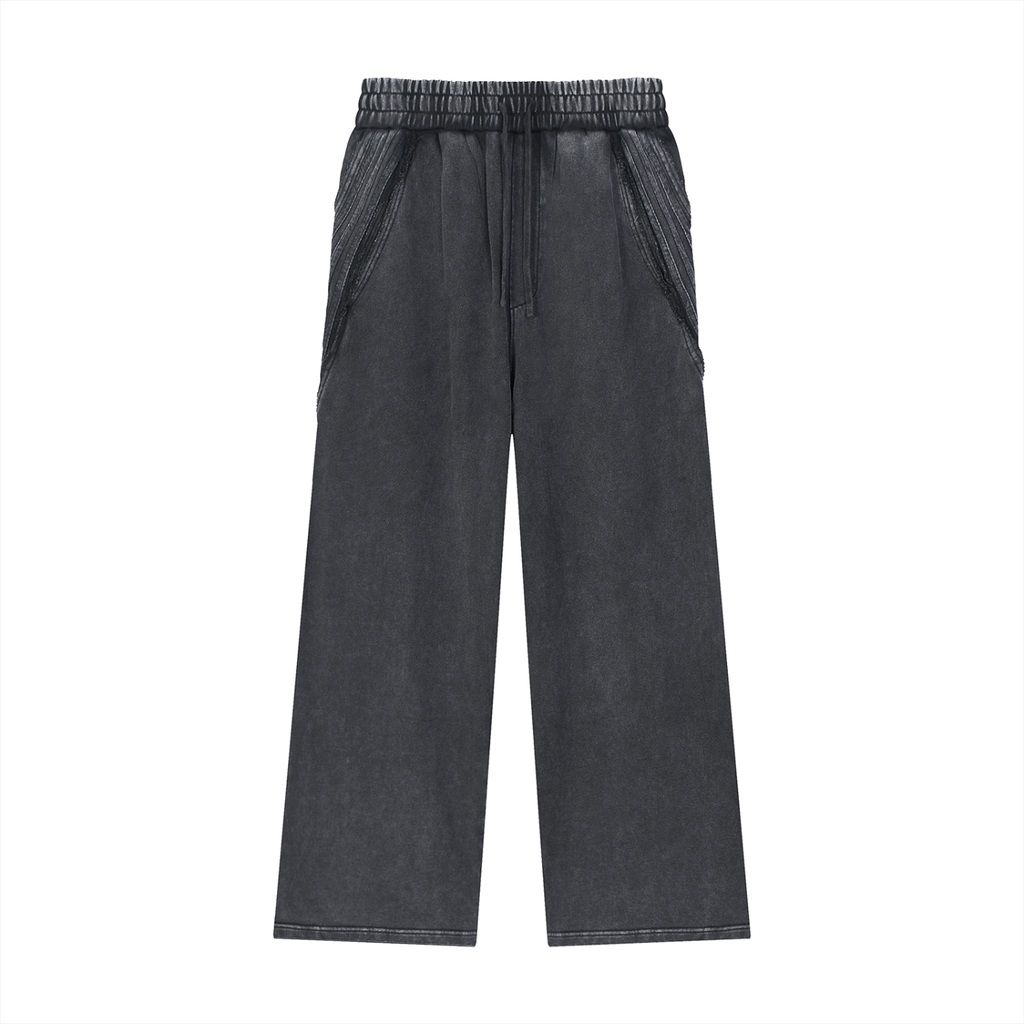 Black wide-leg streetwear pants with elastic waistband and large side pockets on white background