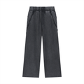 Black wide-leg streetwear pants with elastic waistband and large side pockets on white background