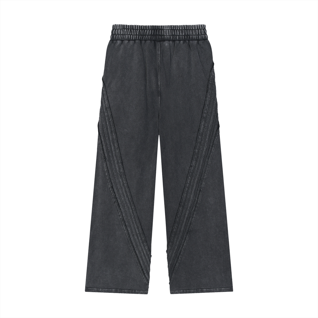 Black wide-leg streetwear pants with elastic waistband and diagonal stitched details