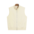 Cream zip-up sleeveless vest with front pockets and clean minimal design