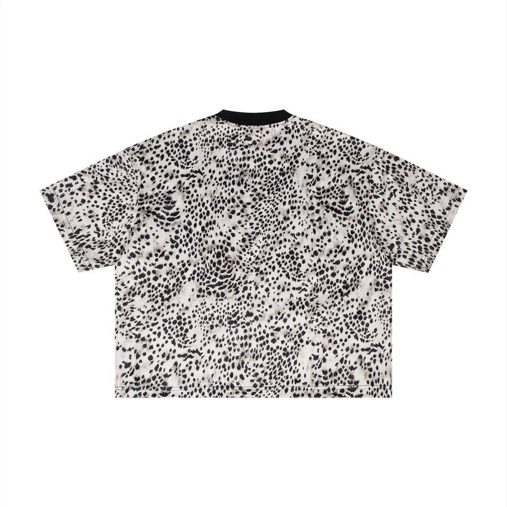 Oversized short sleeve t-shirt with black and white abstract spotted pattern, back view